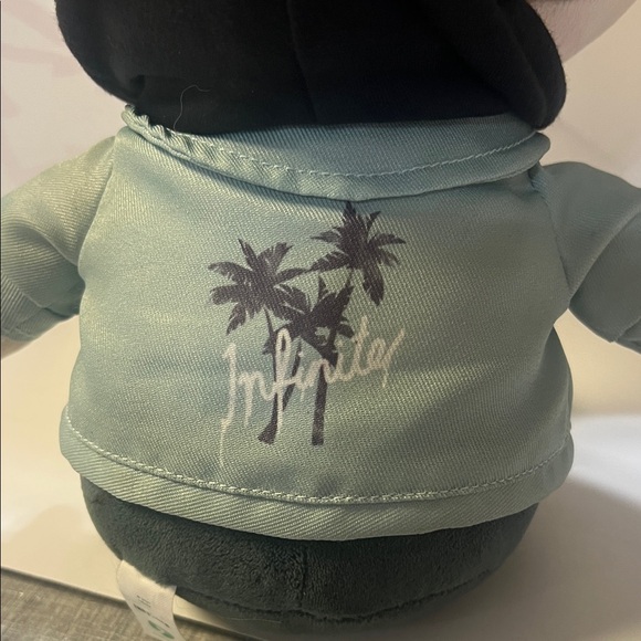 Charming Plush Toy with Brown Hair and Green Jacket - Picture 3 of 5